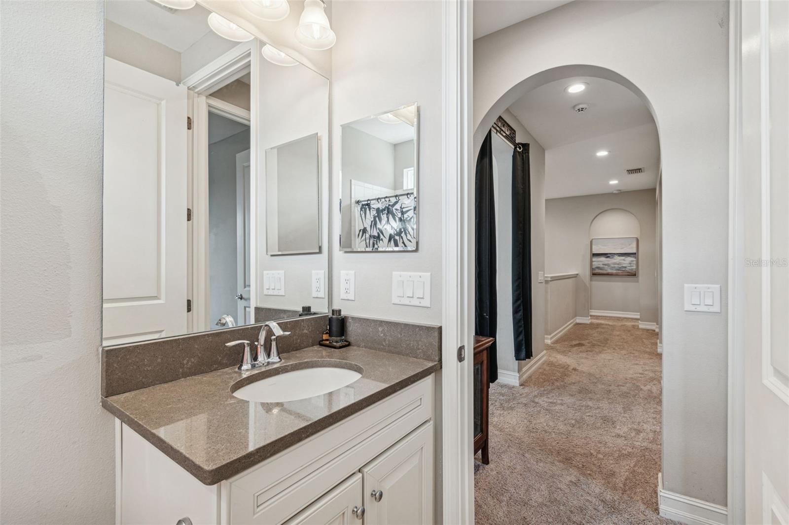 Convenient upper-level bathroom located outside the loft