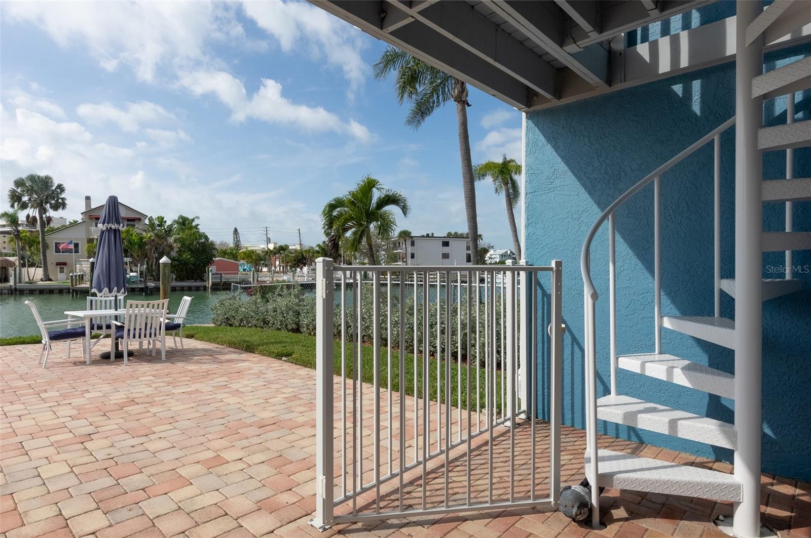 Covered Patio with Spiral Stair Case to 2nd floor