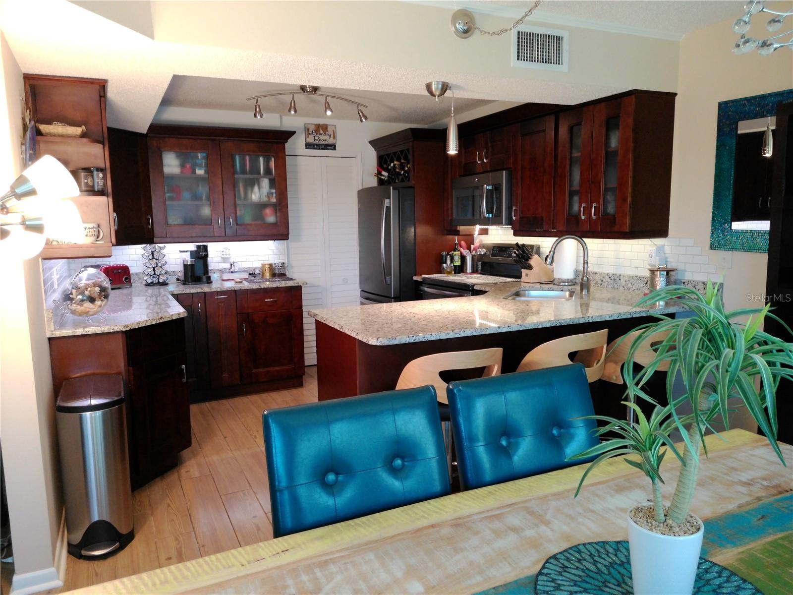View from Dinette area into beautiful kitchen