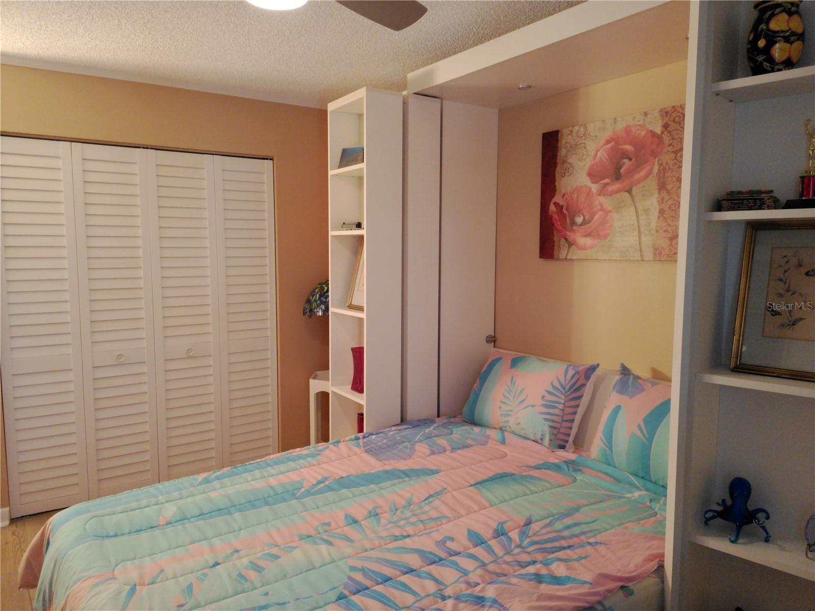 3rd Bedroom has beautifully designed Murphy Bed with side shelving.  REALLY NICE