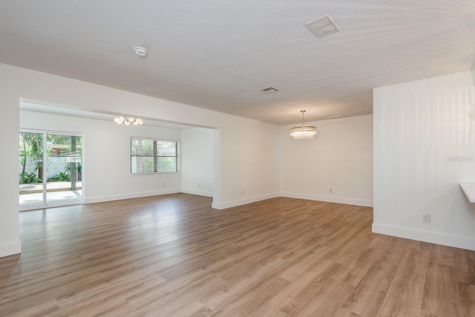 Living room looking into dining and family room