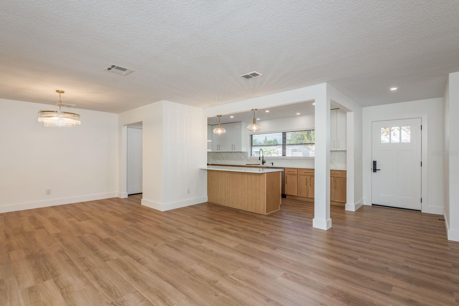 Living room looking back at kitchen