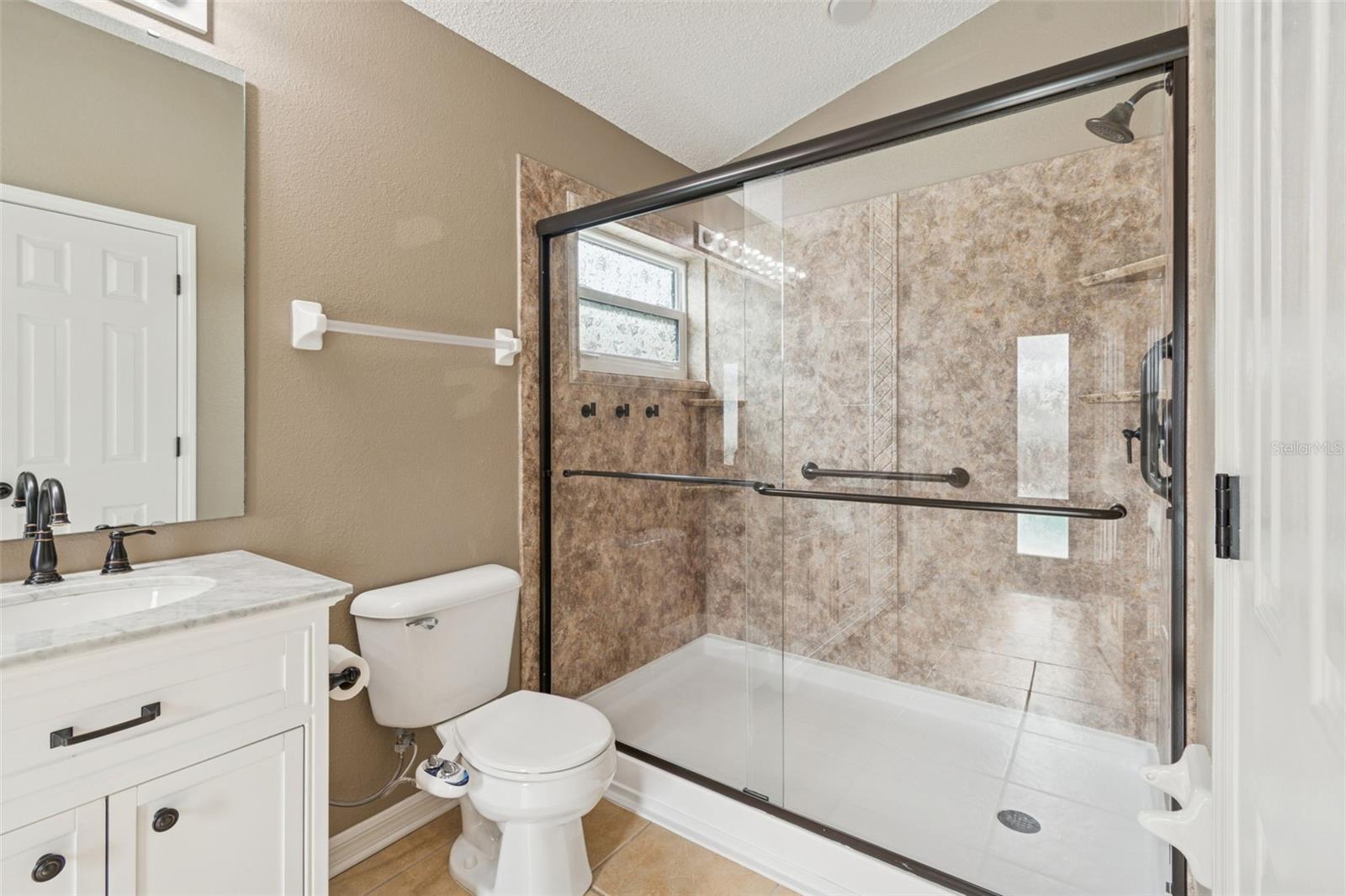 Primary bath with large walk-in shower