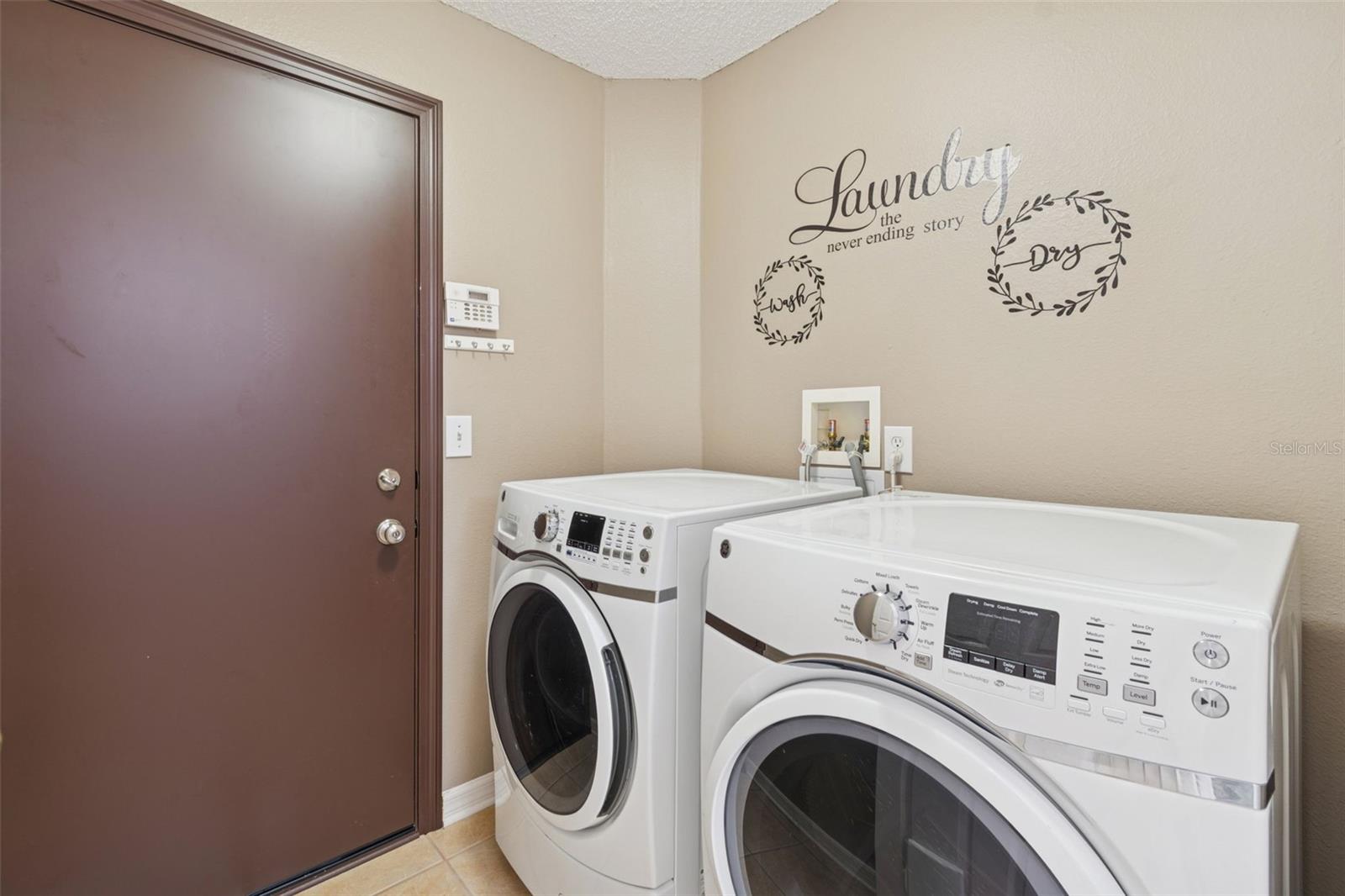 Inside laundry room off garage