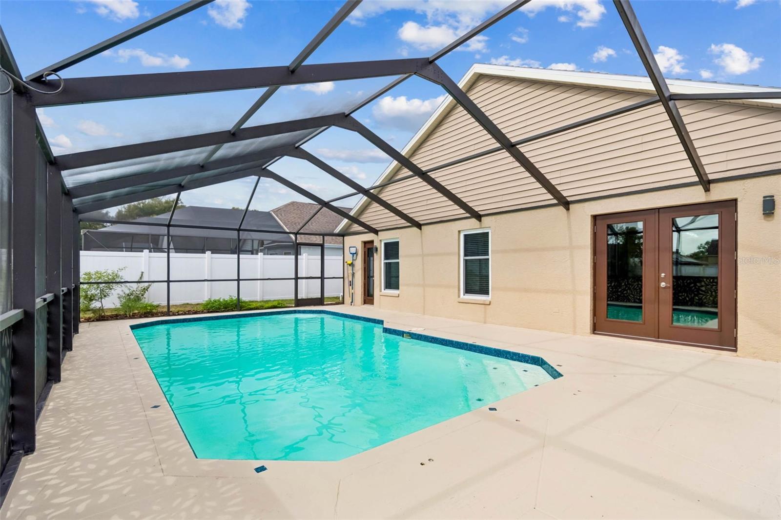 Fully screened in back deck and pool