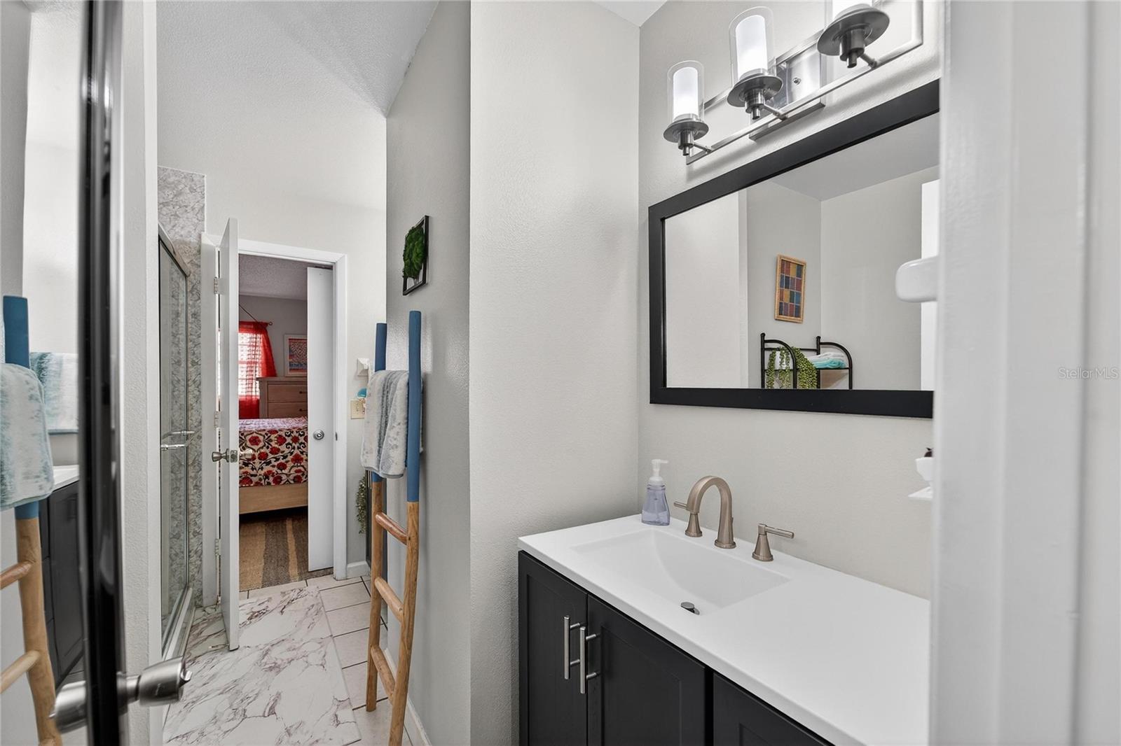 Double vanities with individual mirrors and lighting and getting ready a breeze