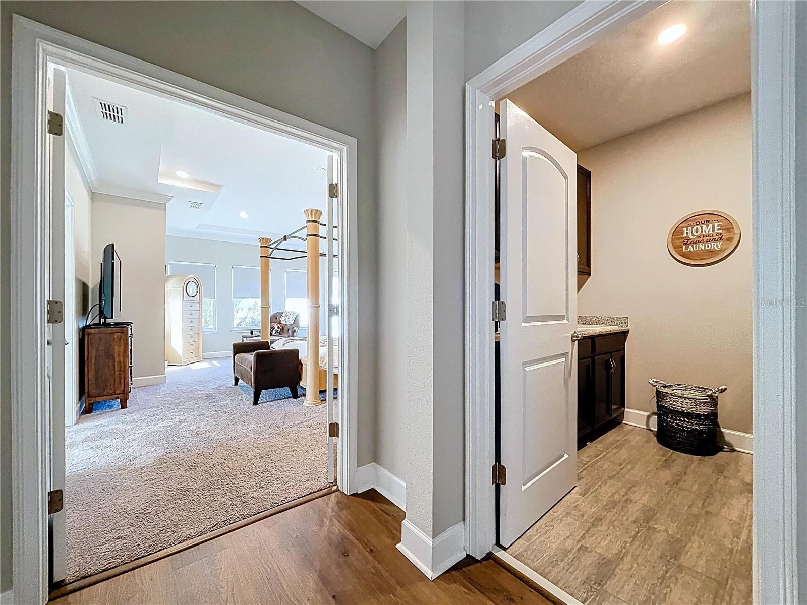 HALL WAY TO LAUNDRY ROOM AND PRIMARY BEDROOM 2ND FLOOR