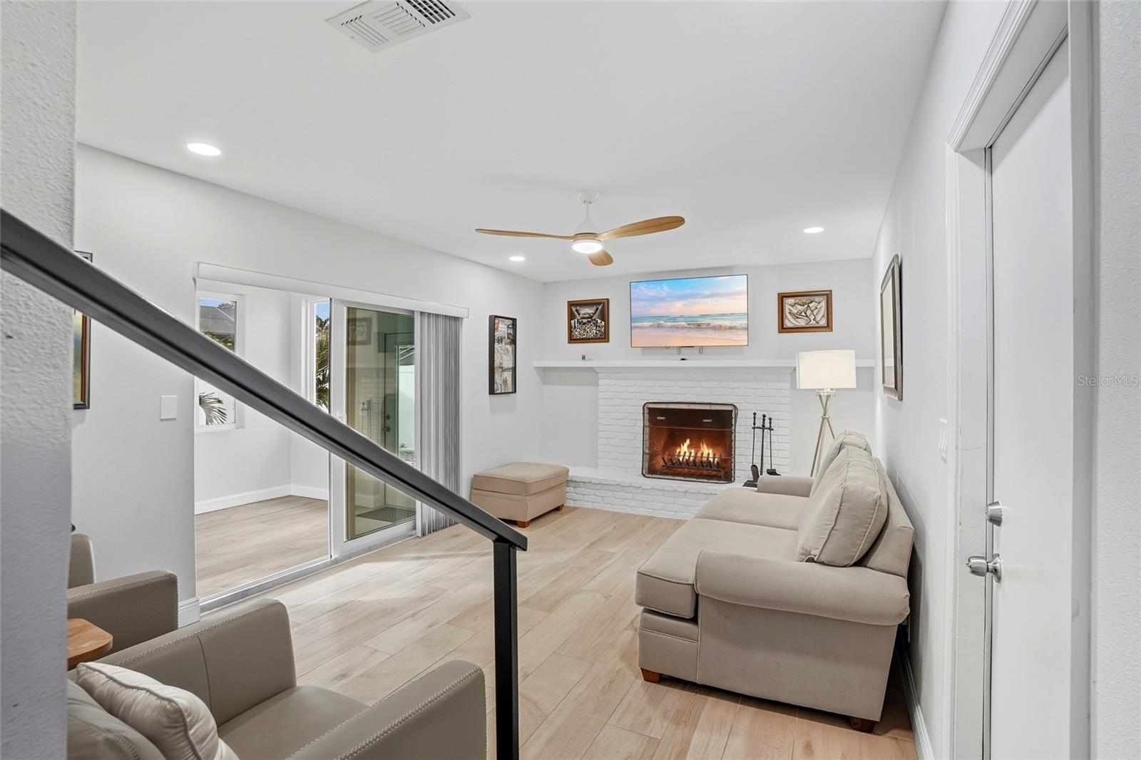 Family Room with Wood Burning Fireplace