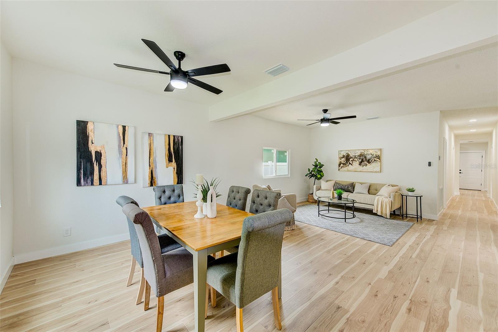 New Hurricane Windows, Flooring, and Light Fixtures