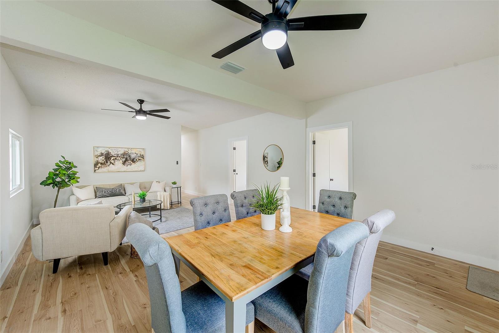 New Hurricane Windows, Flooring, and Light Fixtures