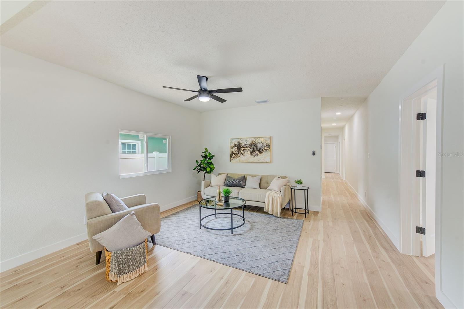 New Hurricane Windows, Flooring, and Light Fixtures