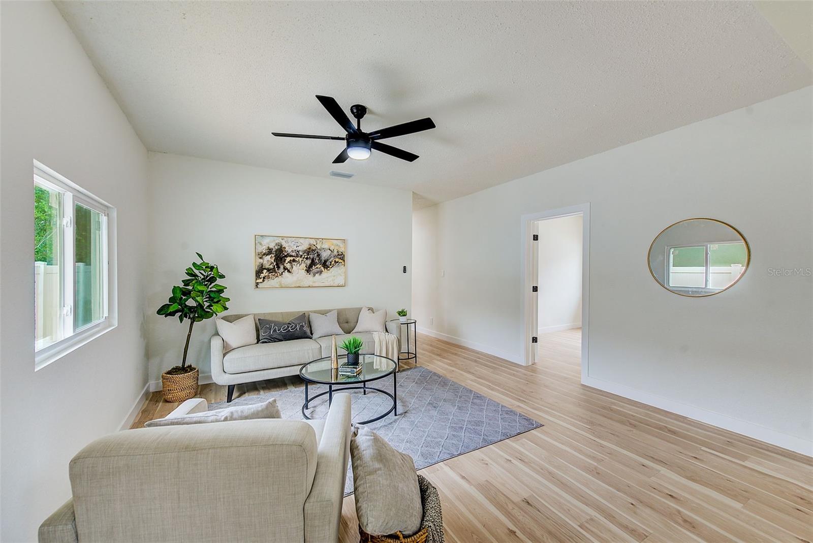 New Hurricane Windows, Flooring, and Light Fixtures