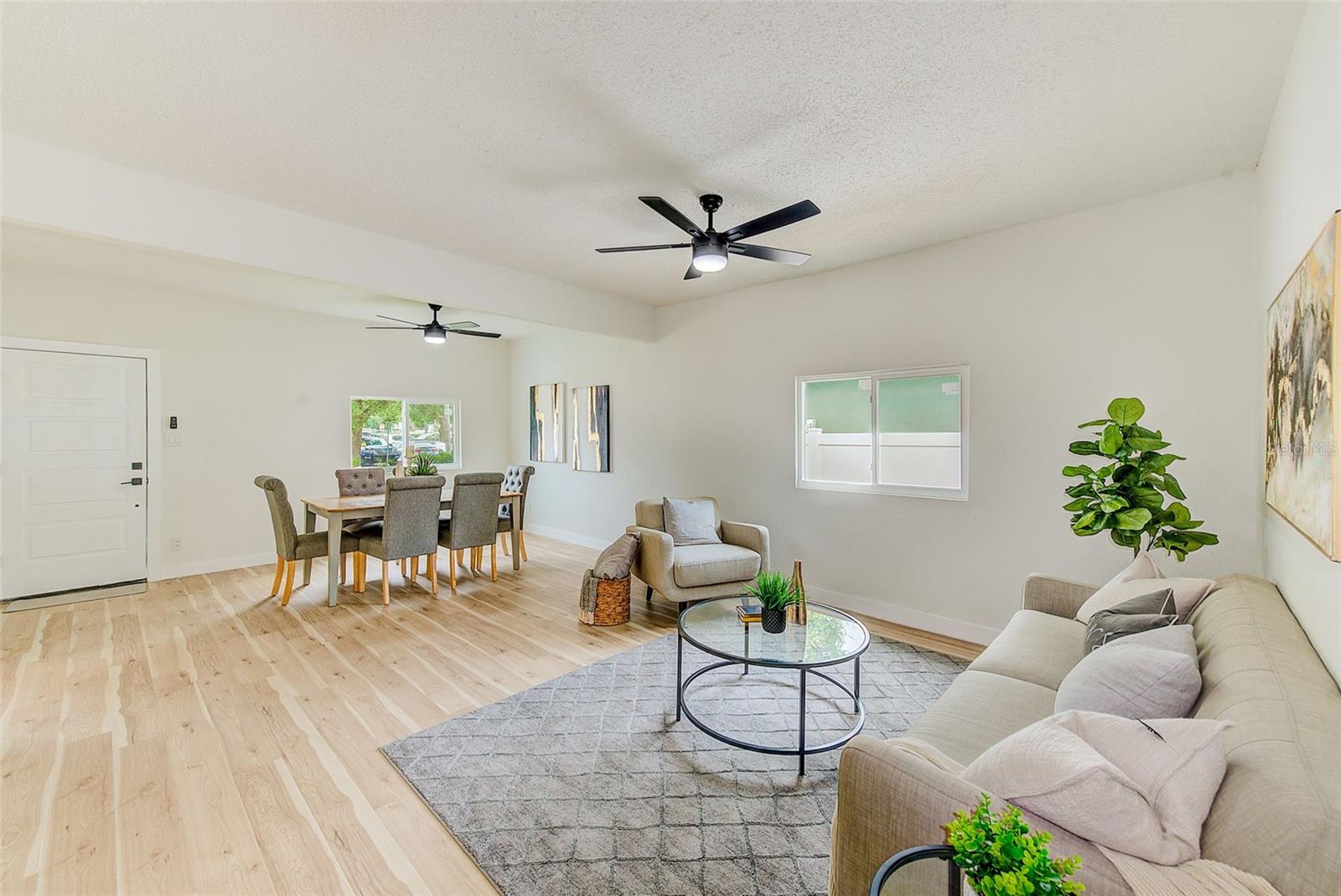 New Hurricane Windows, Flooring, and Light Fixtures