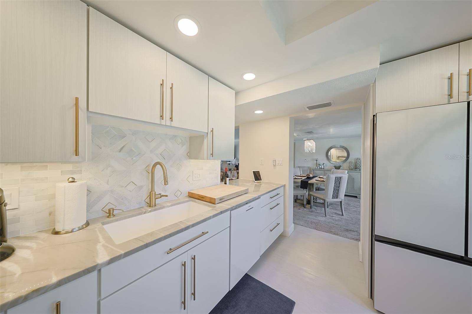 Spacious Kitchen opening into dining area