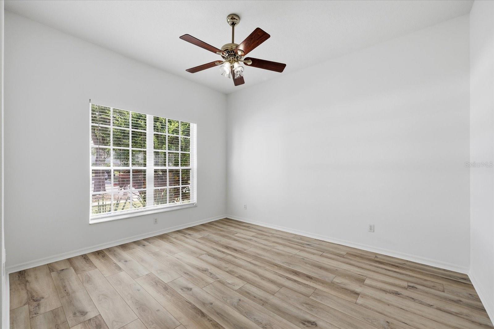 Front sitting room or perfect for additional office space, playroom, homeschool set up!