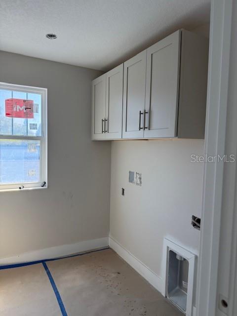 LAUNDRY CABINETS INCLUDED