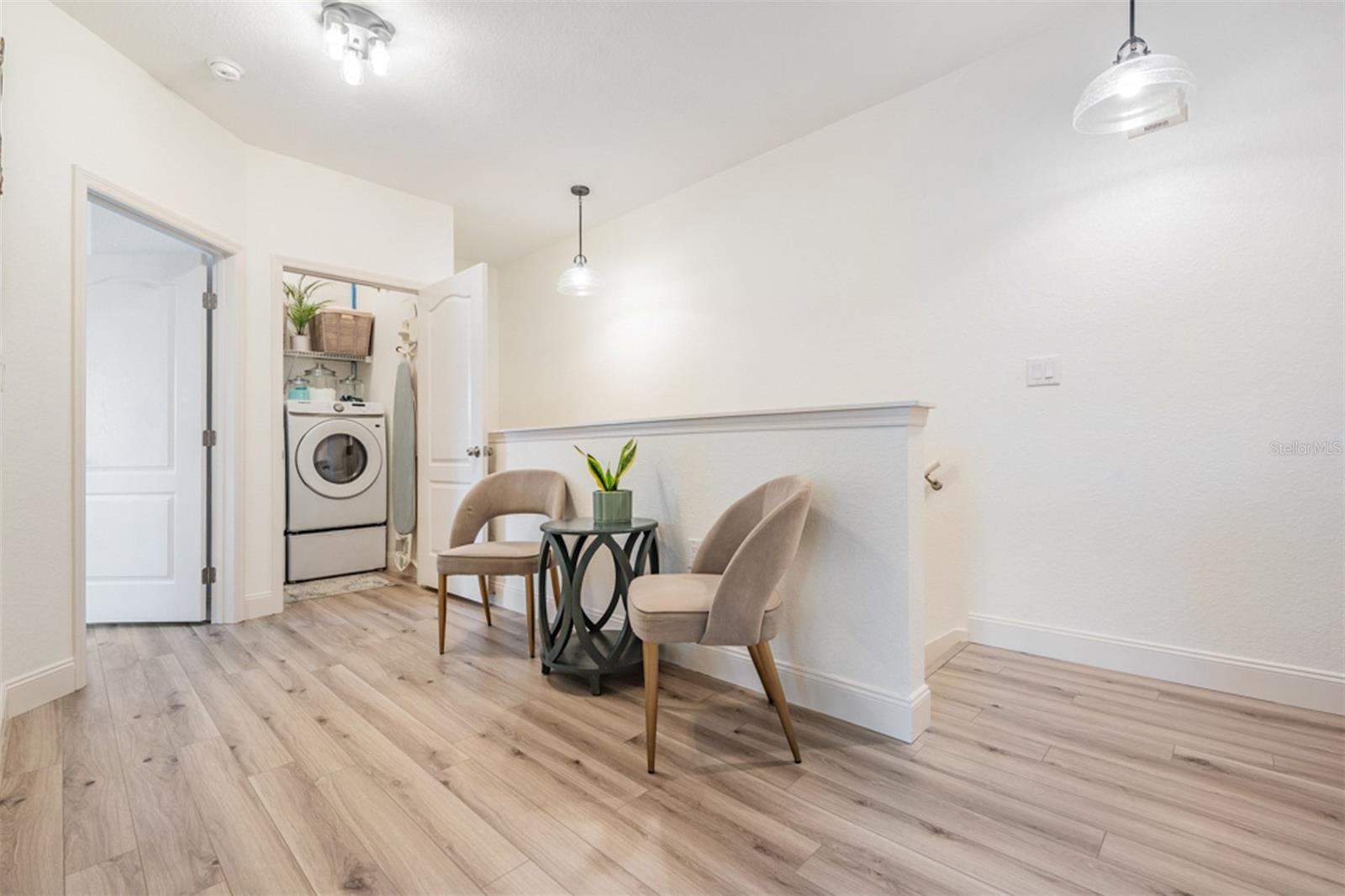 Laudry room located upstairs adjacent to bedrooms