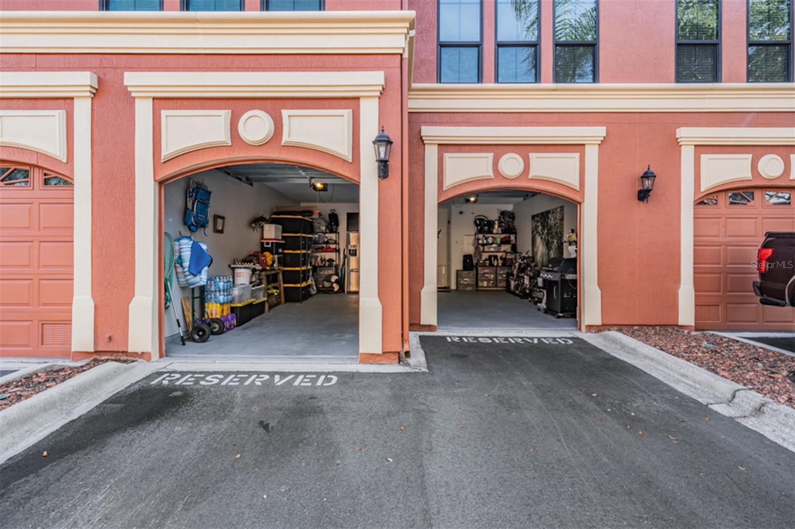 2 reserved parking spaces, in front of your garages