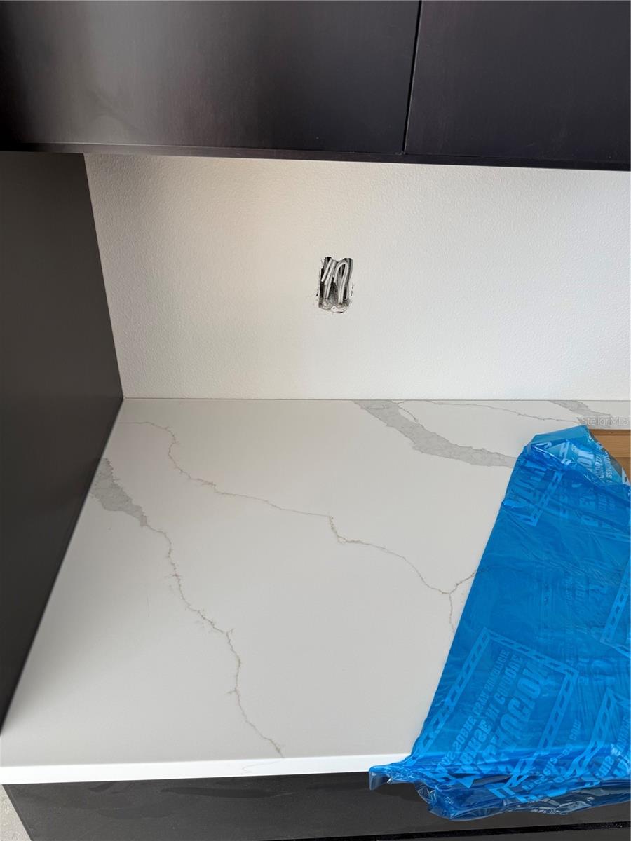 Quartz Countertops throughout