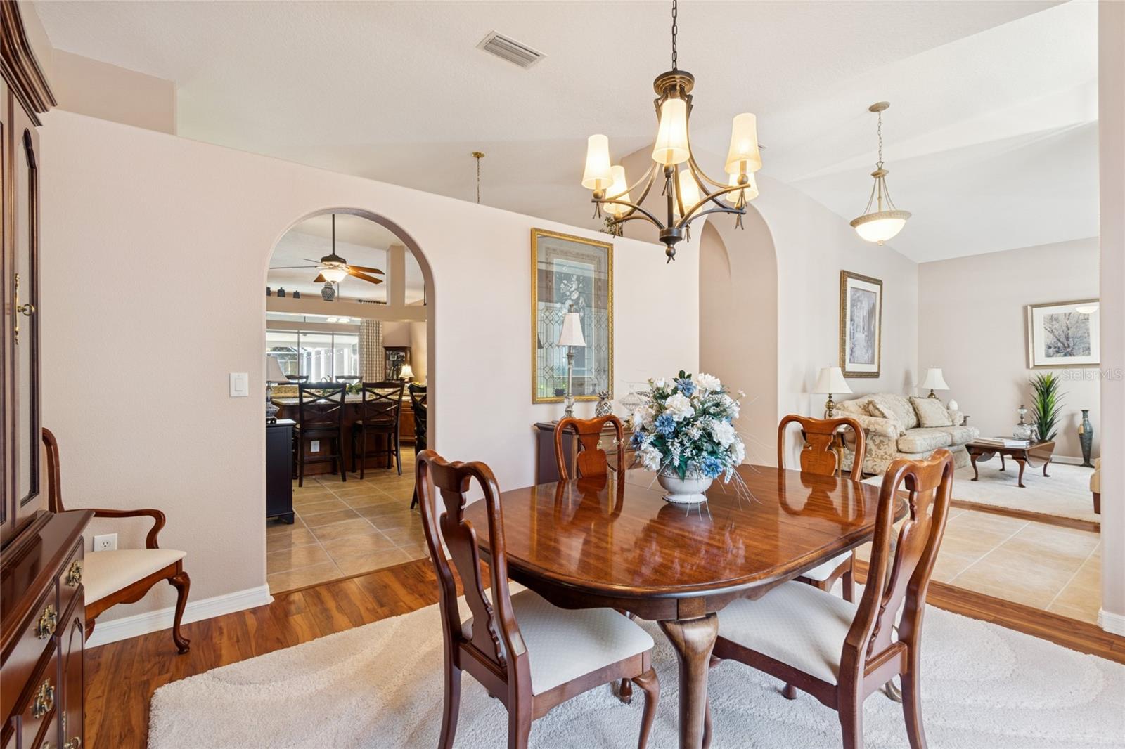 FORMAL DINING ROOM WITH VIEW OF FOYER AND FORMAL LIVING ROOM
