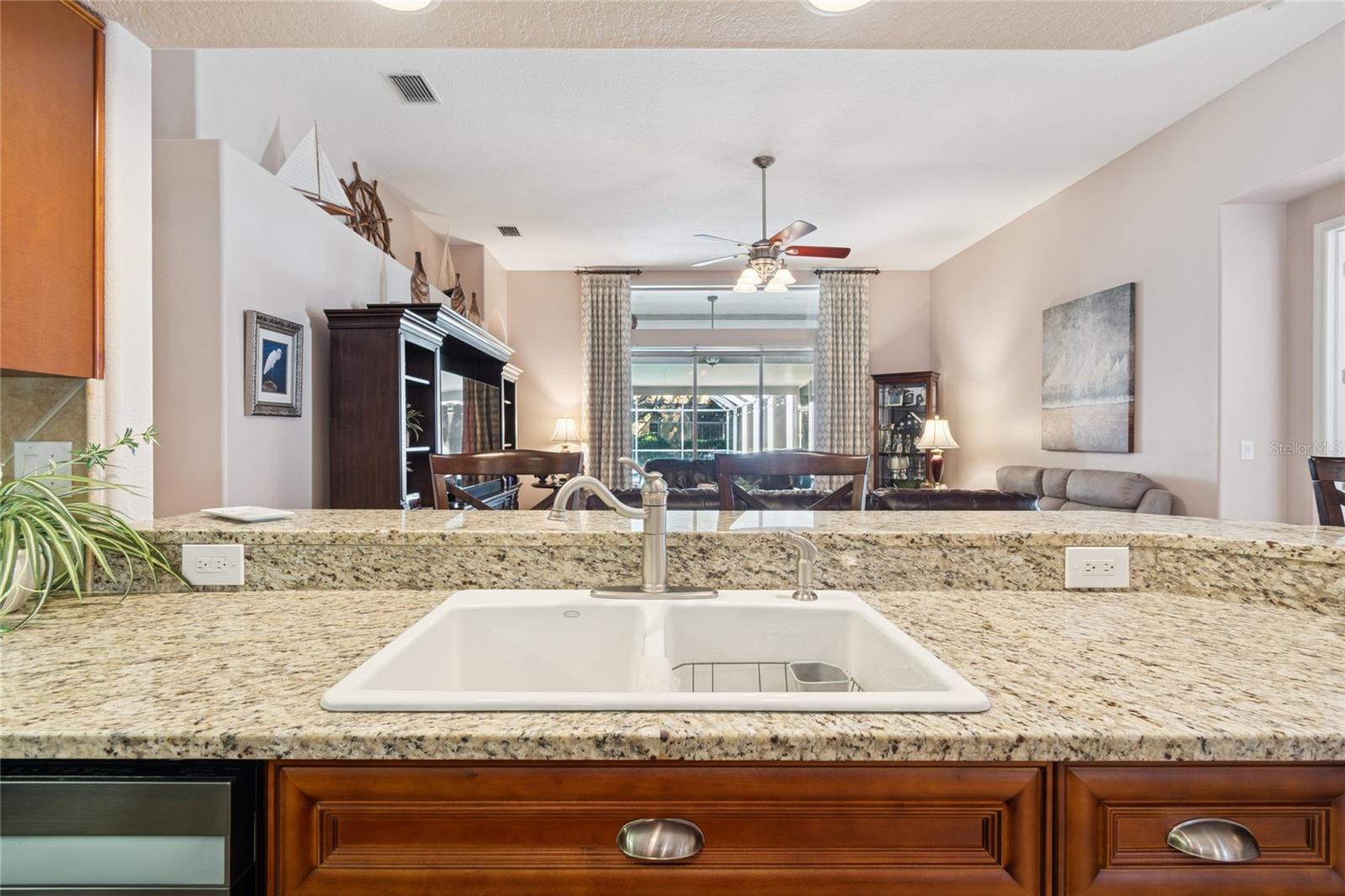 KITCHEN WITH VIEW OF FAMILY ROOM