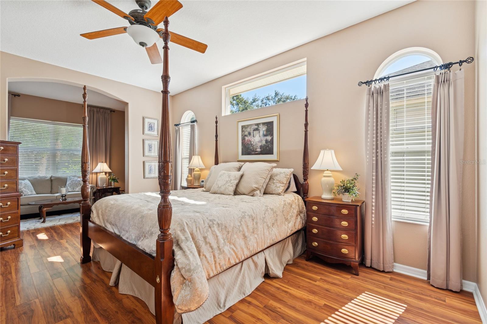 OWNER'S RETREAT WITH VIEW OF BEDROOM AND SITTING AREA