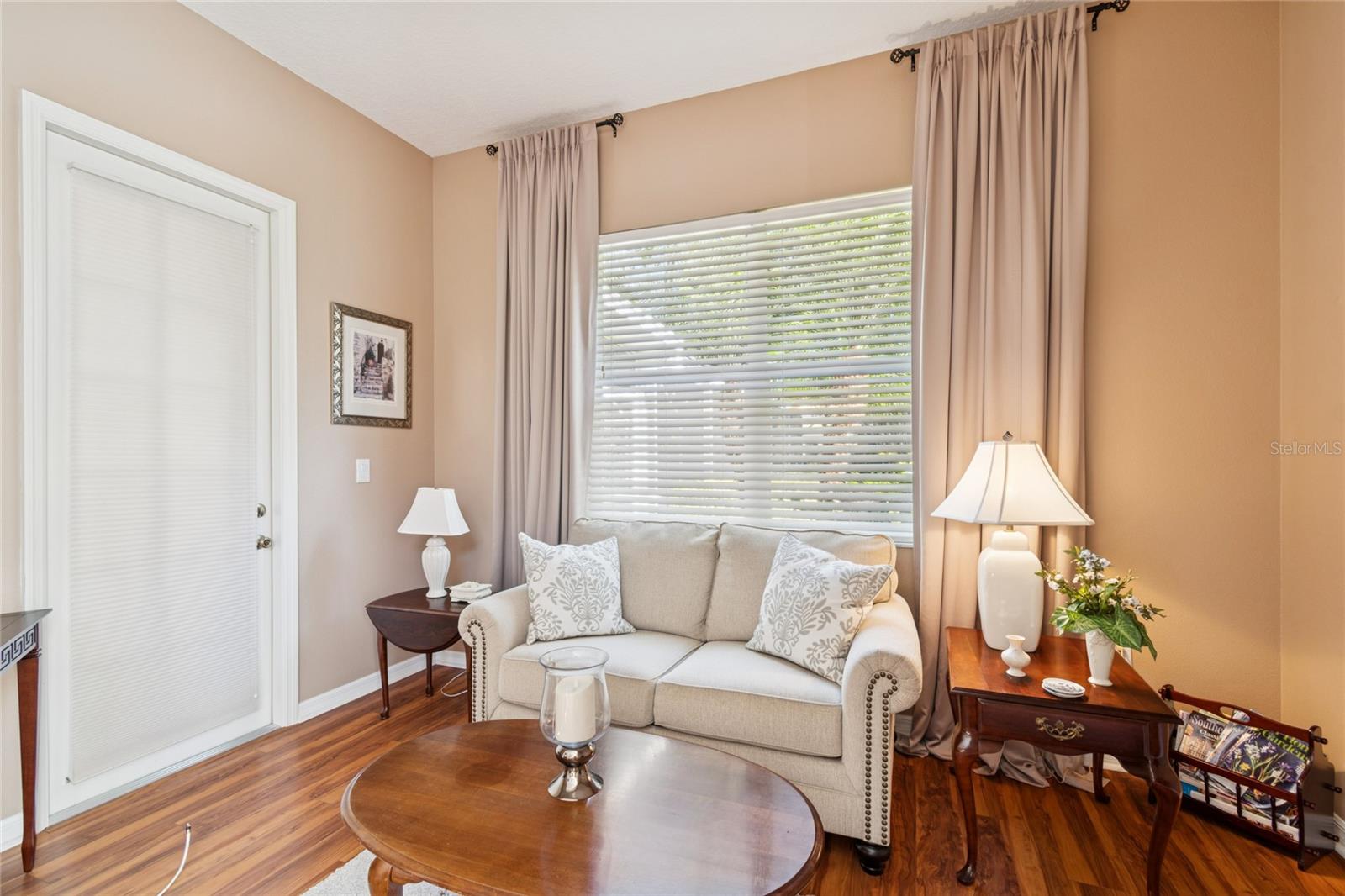 OWNER'S RETREAT SITTING AREA WITH FRENCH DOOR TO POOL