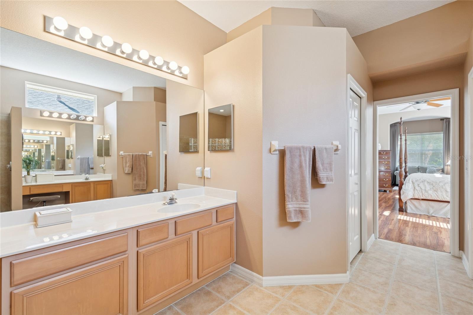 VANITY TWO WITH VIEW OF HALLWAY TO BEDROOM