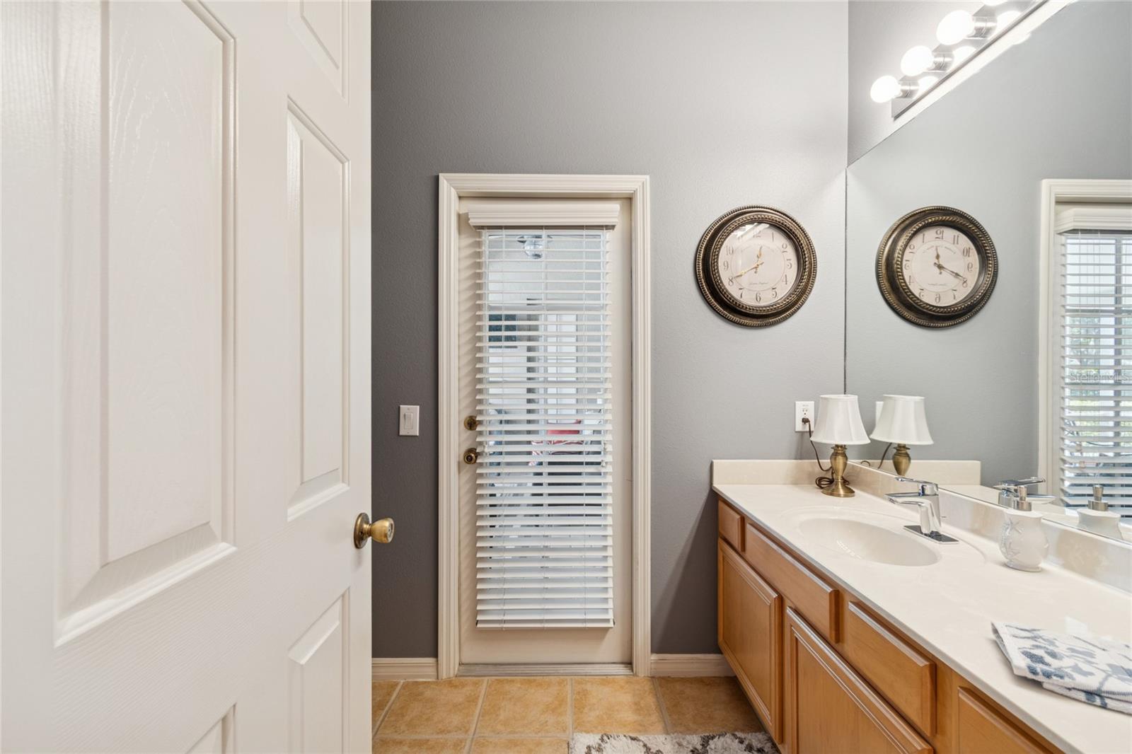 BATHROOM 3/POOL BATH SERVES BEDROOM 4 AND 5, FLEX ROOM AND POOL