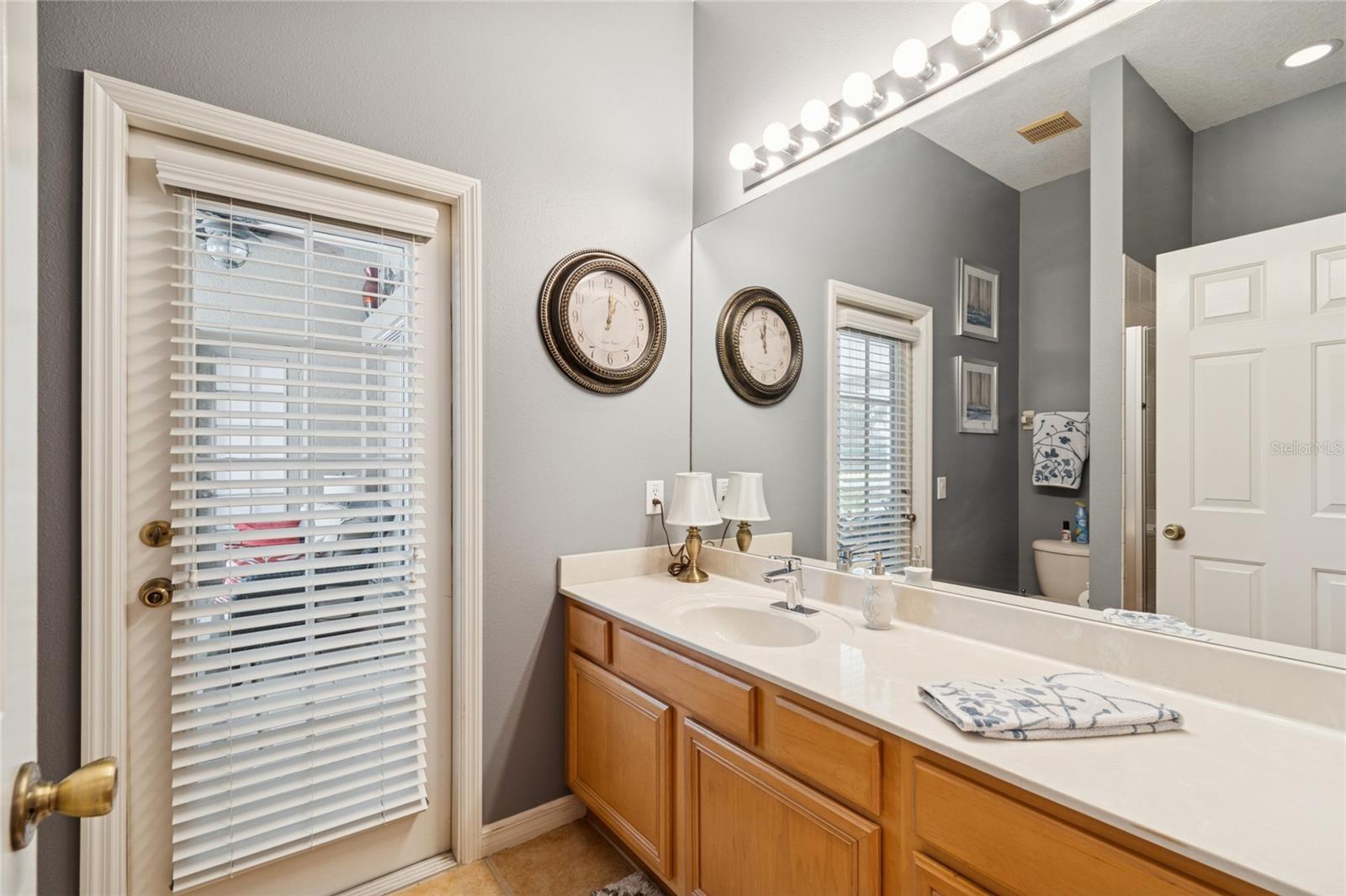 BATHROOM 3/POOL BATH  SERVES BEDROOM 4 AND 5, FLEX ROOM AND POOL