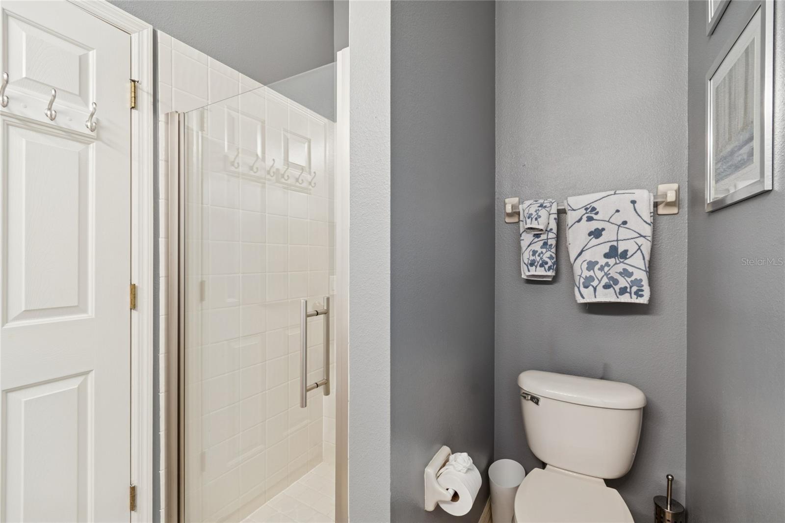 BATHROOM 3/POOL BATH SERVES BEDROOM 4 AND 5, FLEX ROOM AND POOL