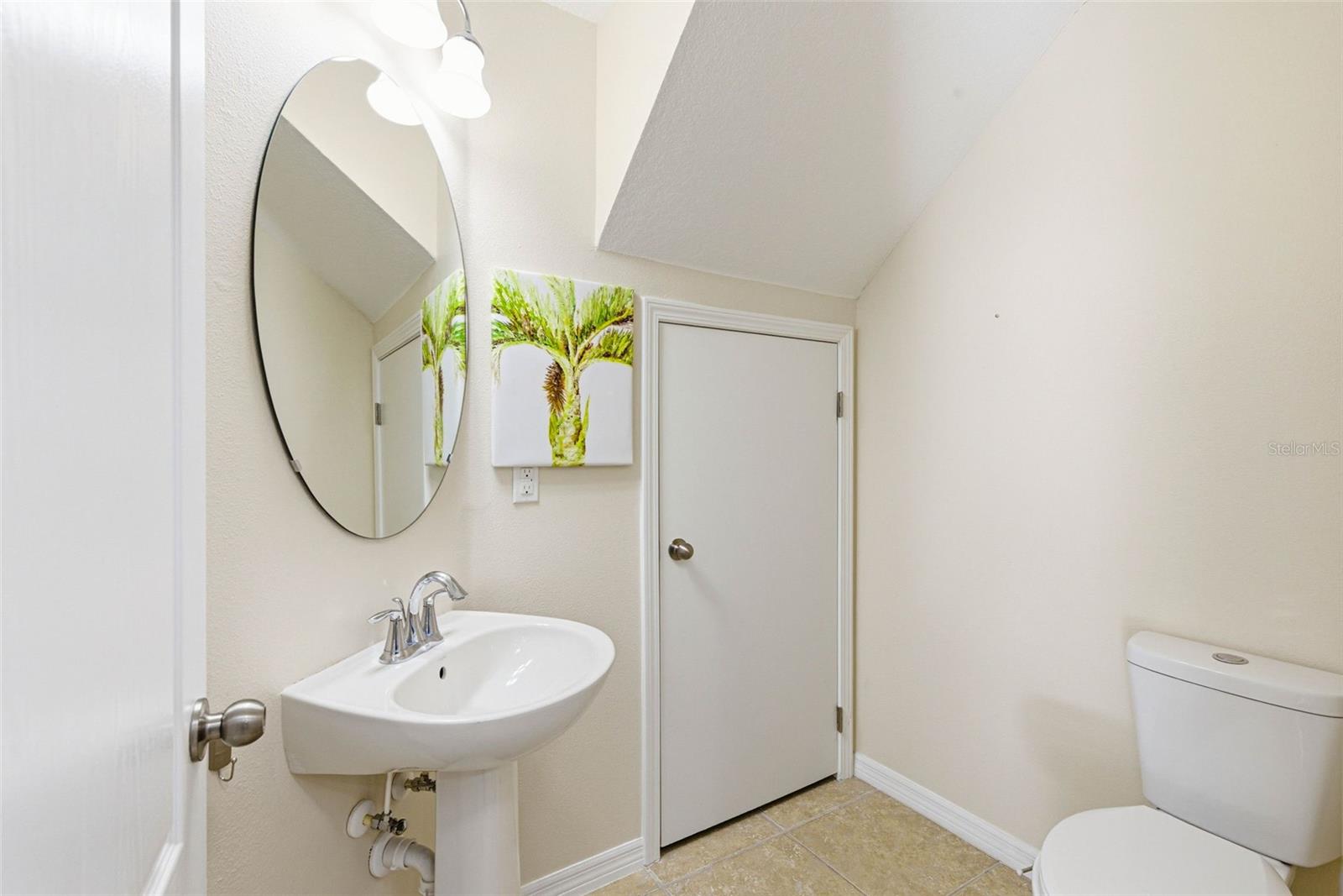 Half Bath with Water Heater closet on main floor