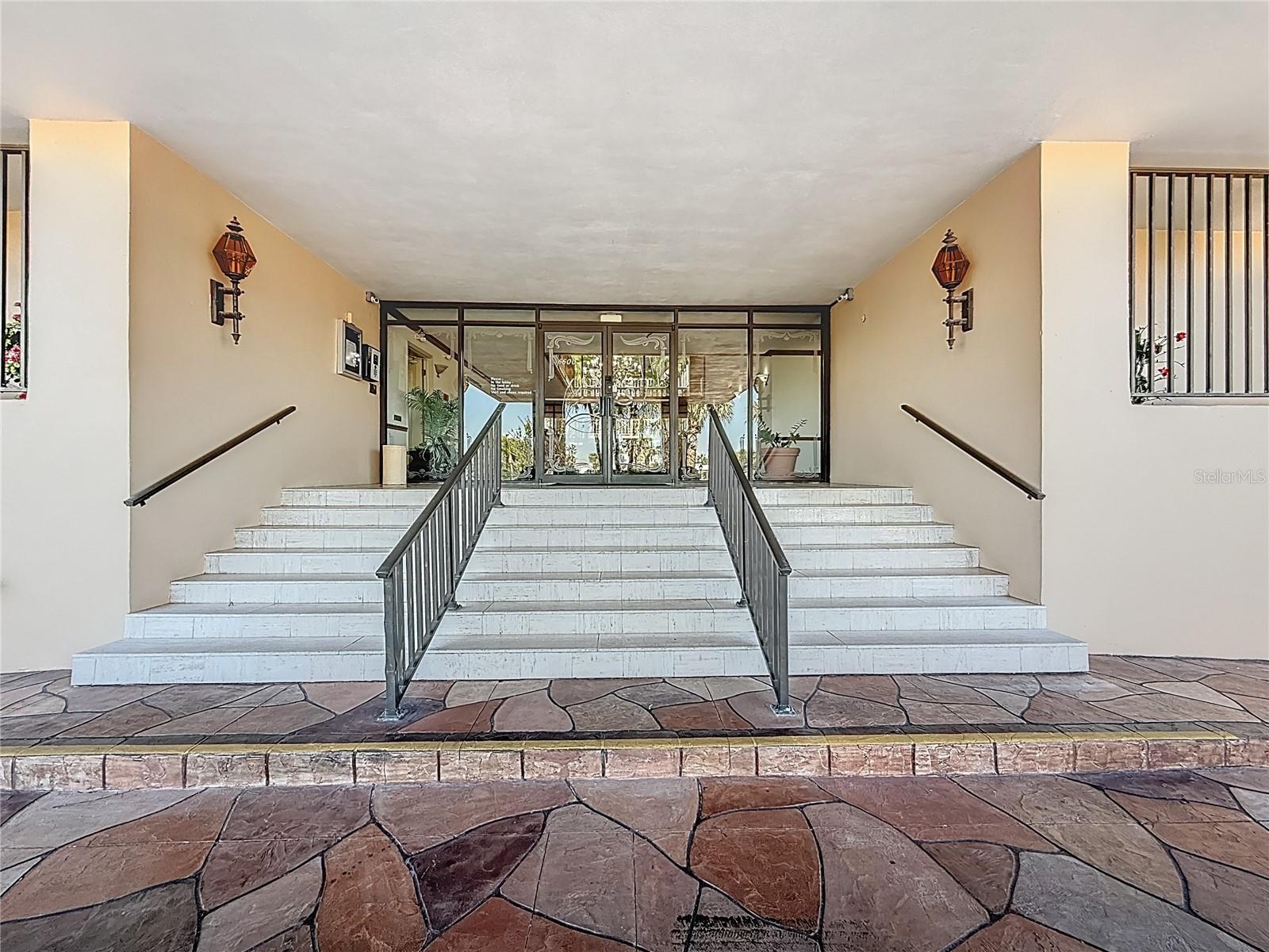 Steps that lead you into the secure lobby of Building B