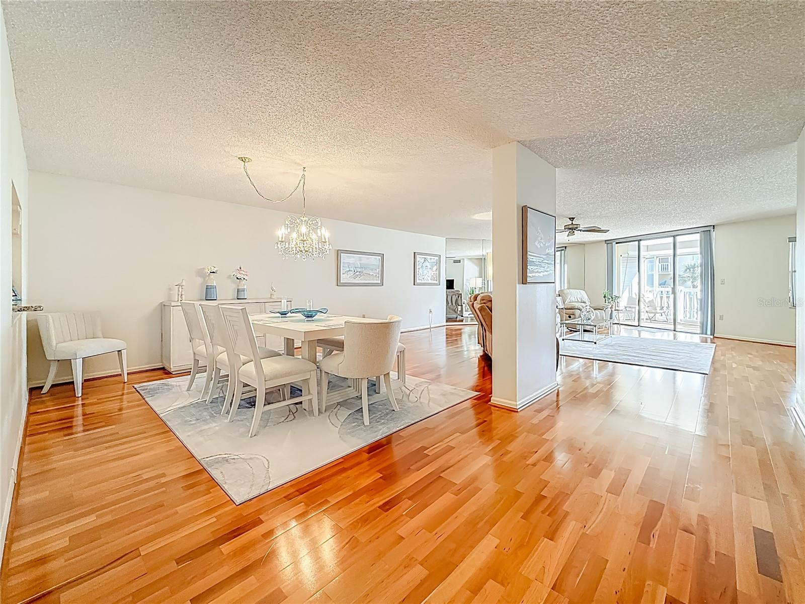 This shows the dining room and living room and gives you an idea of how spacious this unit is.