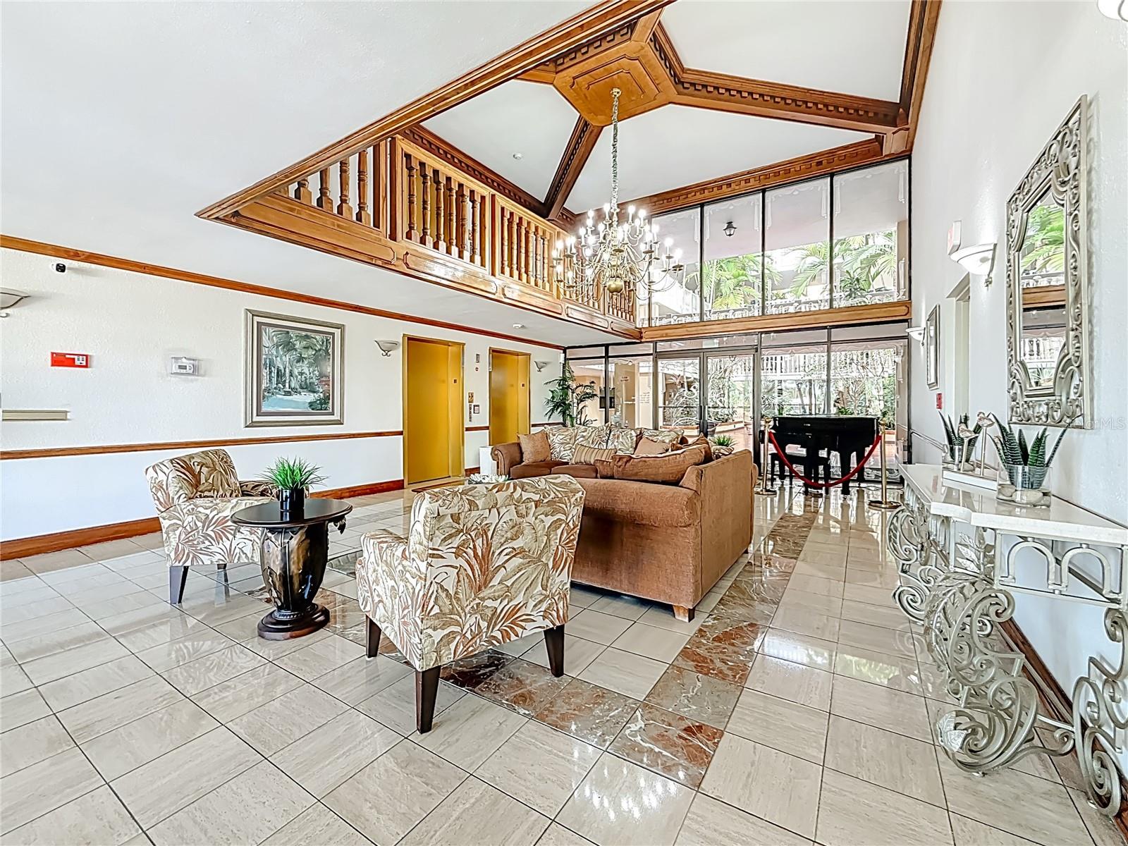 An elegant lobby greets you as you enter and head to the elevators.