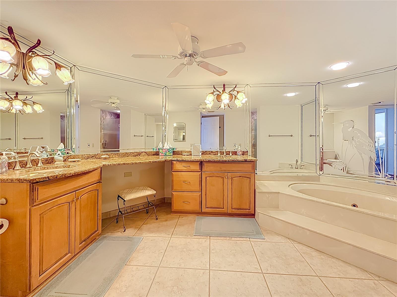 This is another view of the double vanities and make-up area in the primary bathroom