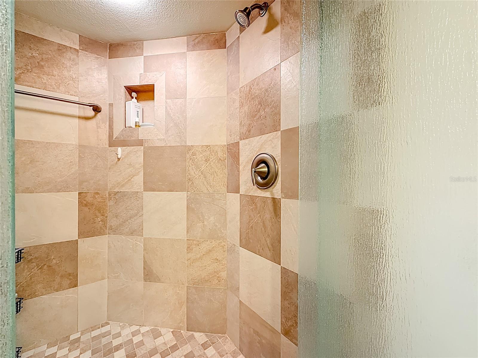 View of the walk-in shower in the 2nd bathroom