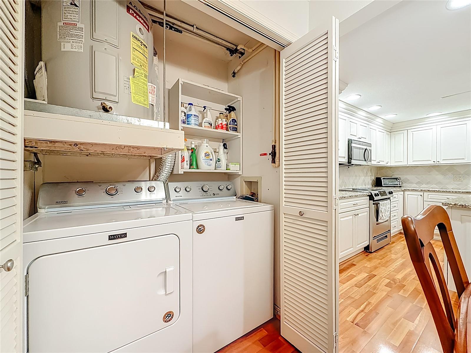 Washer and dryer closet in the kitchen