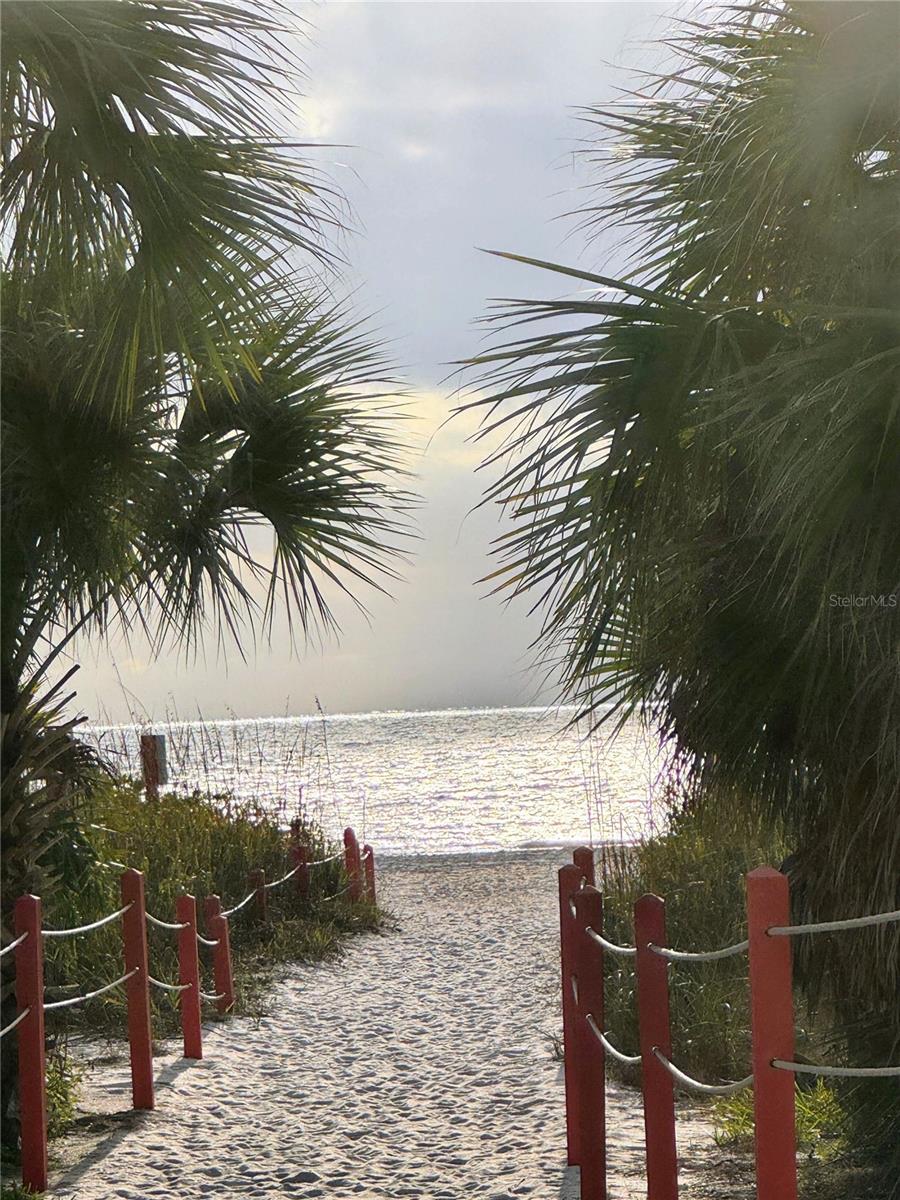 You just walk out of the back gate in the back of your building and onto the soft sandy beach.
