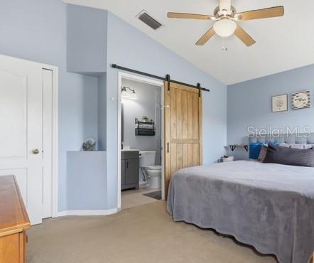 I love the barn door clsoing off the bathroom