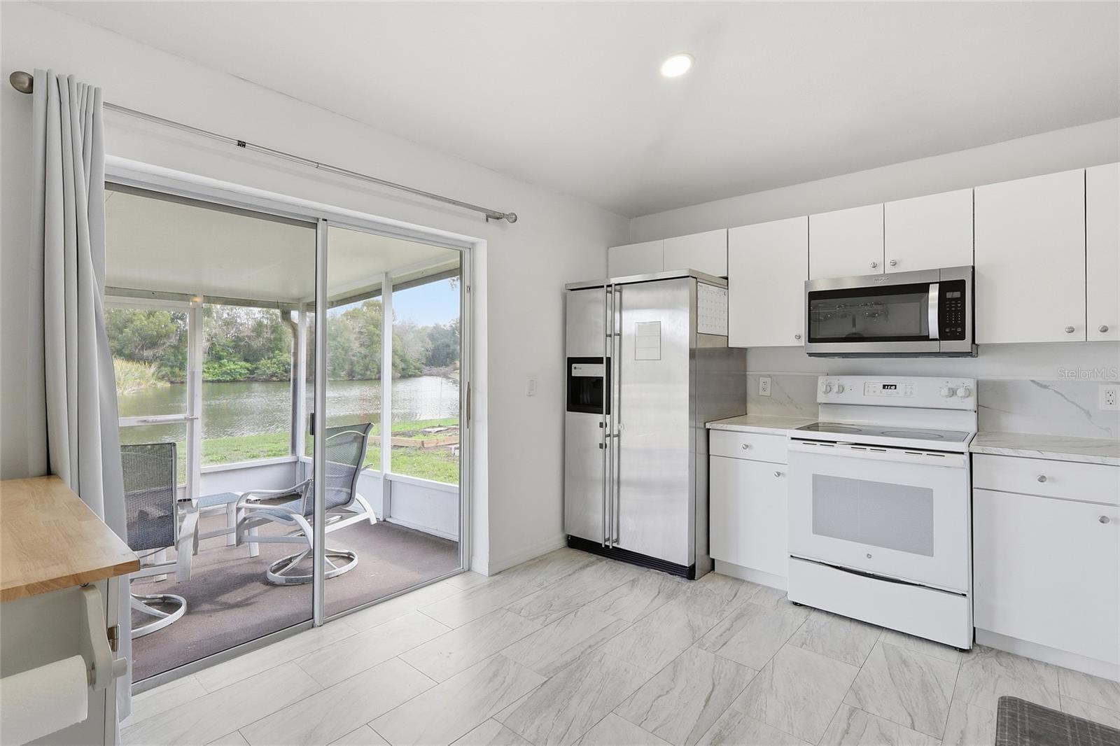 Nice kitchen with a lovely view of the backyard!