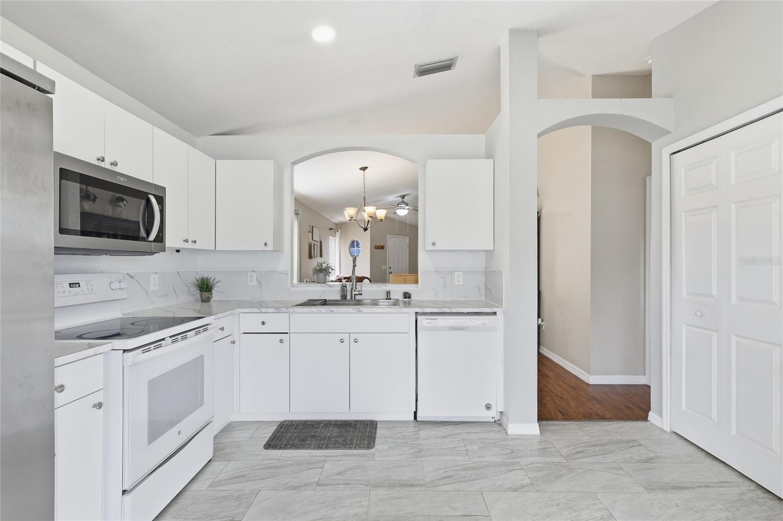 You can see the double door pantry inside the kitchen.