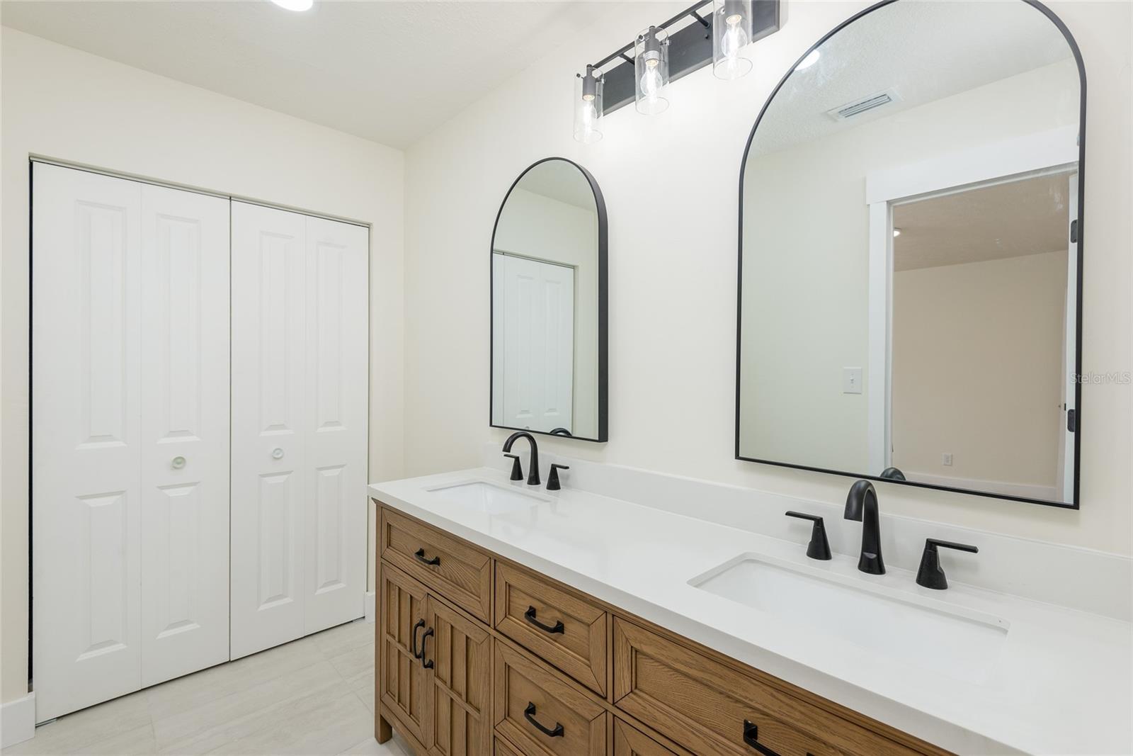 Primary Bathroom and linen Closet