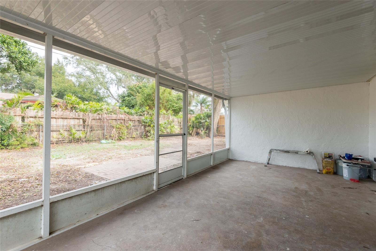 Screened room with new roof panels and new screen