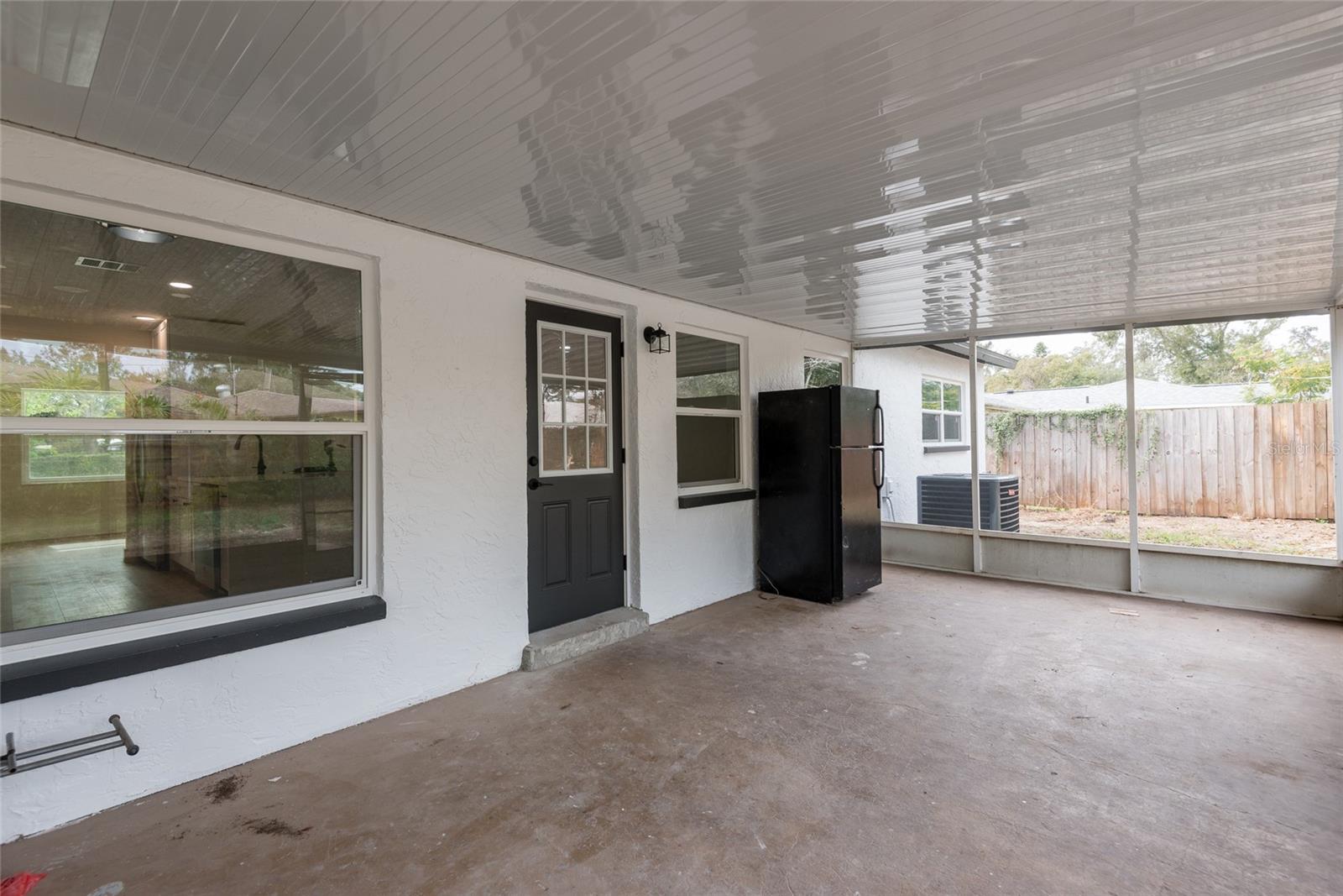 Screened room with new roof panels and new screen
