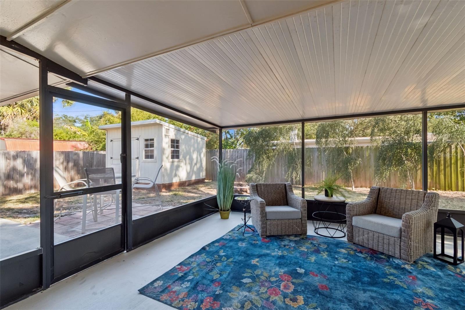 This fully fenced yard has plenty of room to run and play, and the firepit and shed are fabulous extras!! Make it a "she-shed", "man-cave" , work shop or playhouse! Whatever you want, but right now it's terrific storage for lawn stuff, tools, etc!