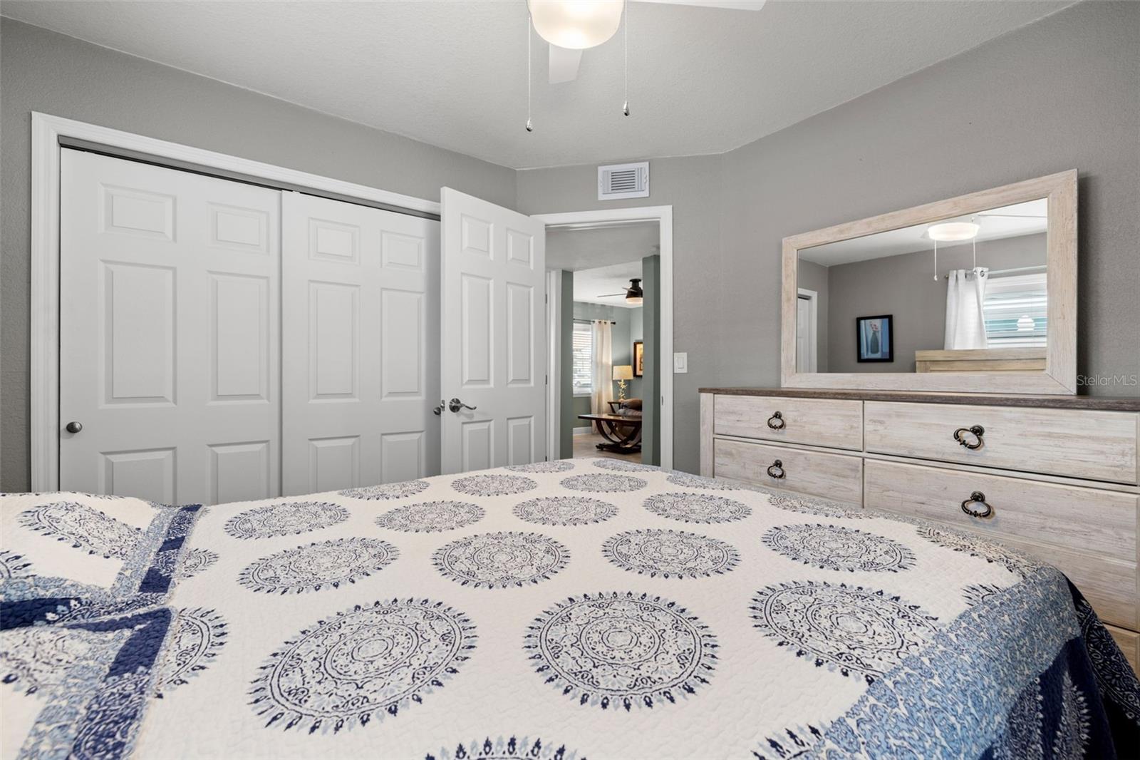 Light-filled bedroom with relaxed coastal feel