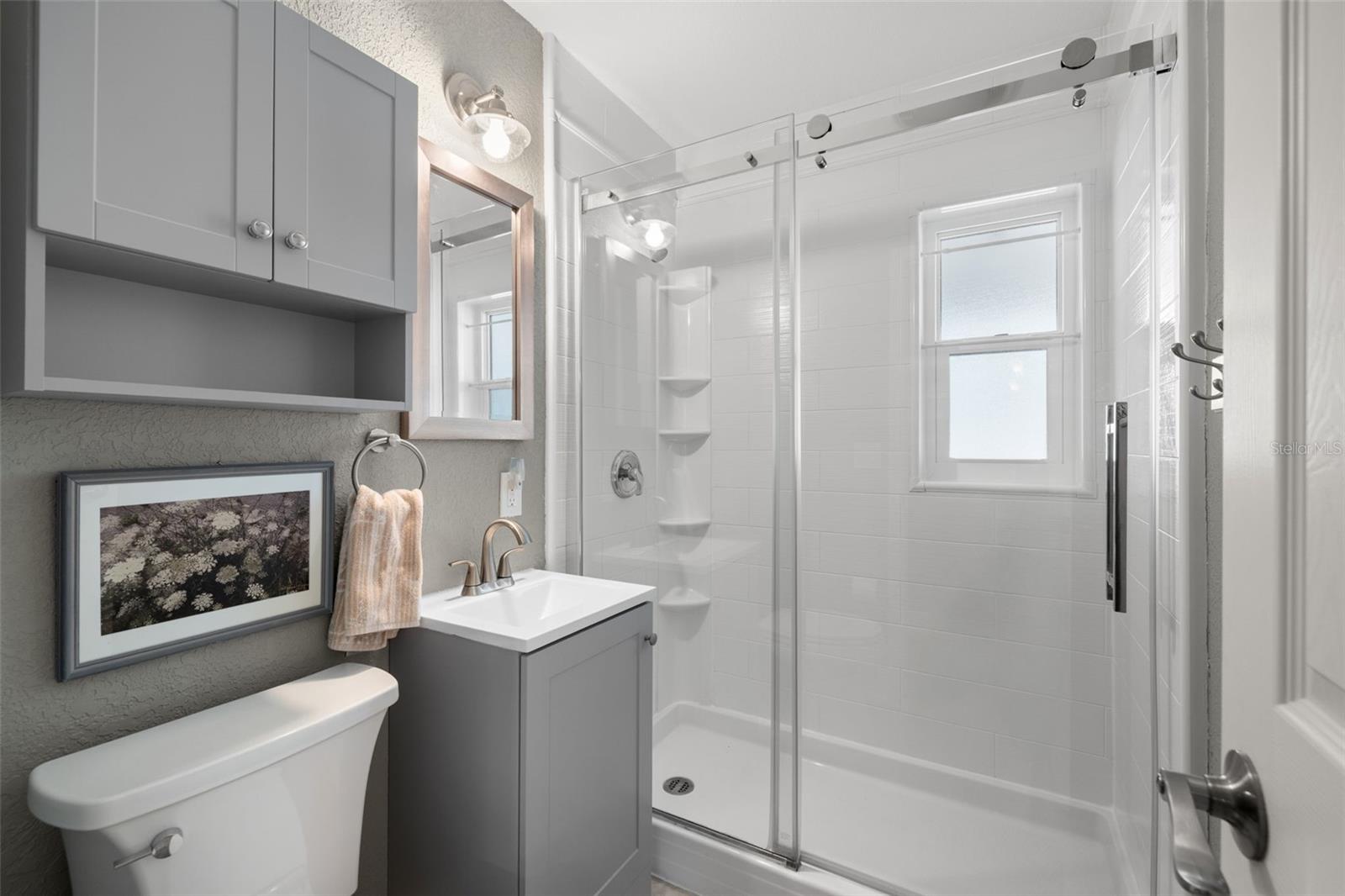 Updated bath with clean, modern finishes