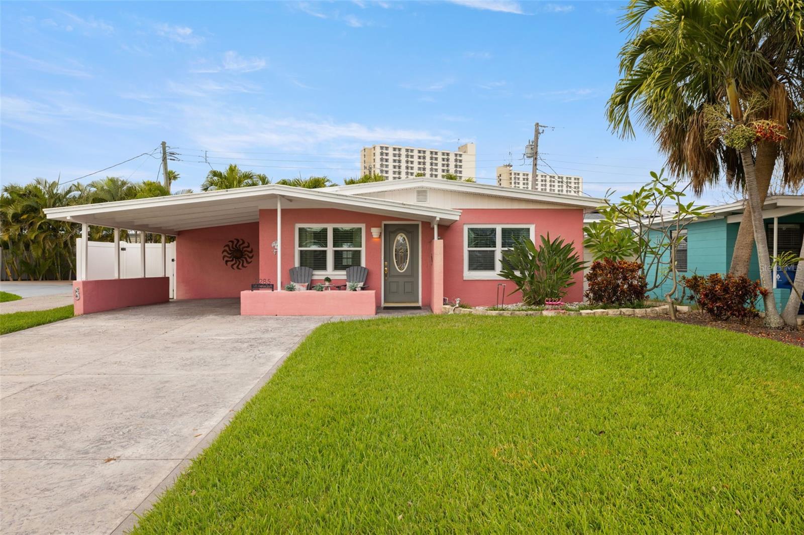 Charming pink beach cottage with curb appeal
