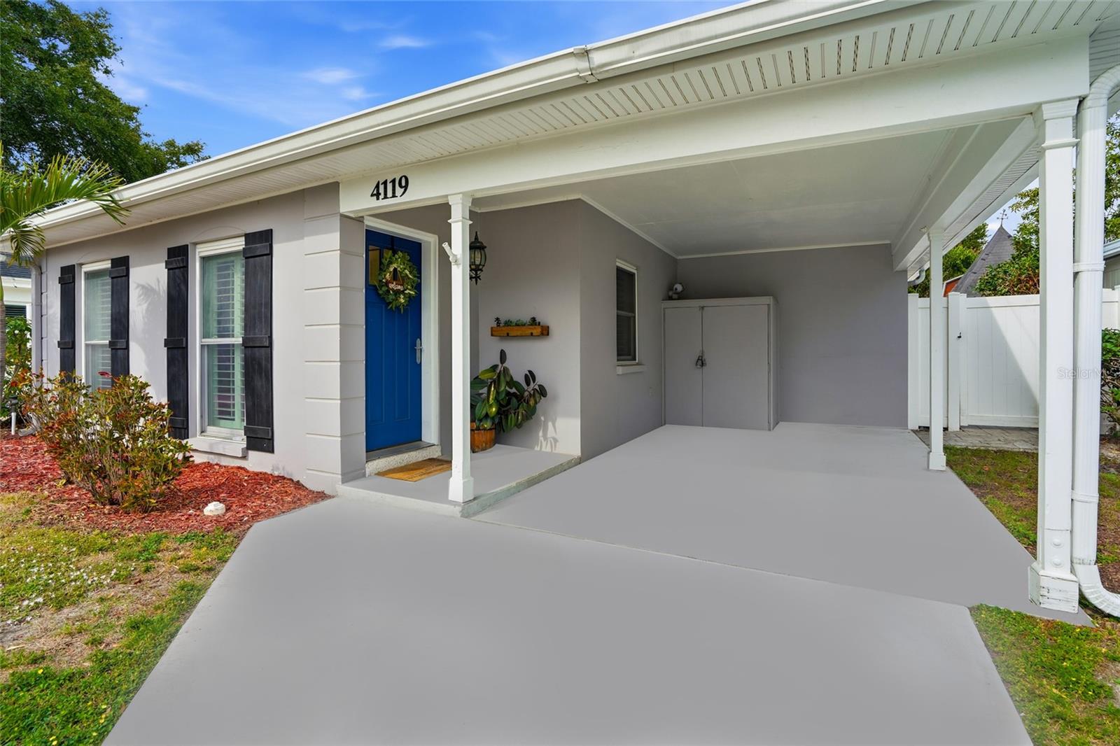 Carport with shed still large enough to fit a car